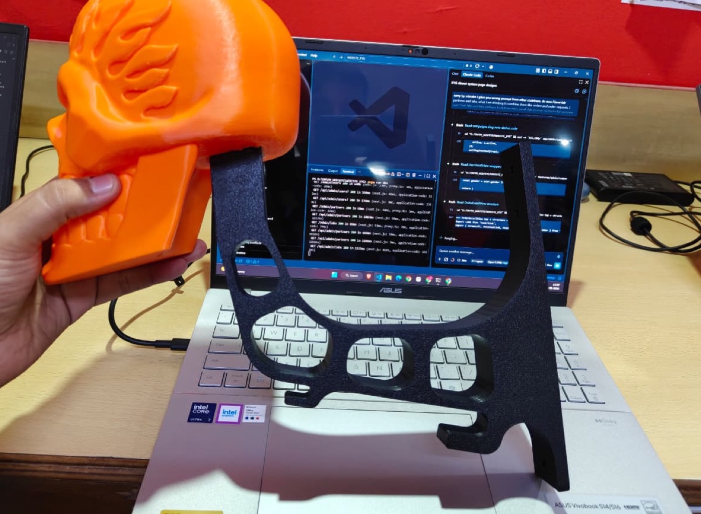 The real prototype, photographed on a phone.